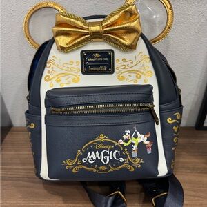 Loungefly Navy and Gold Disney Magic Backpack